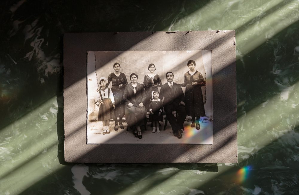 My four years old grandmother (bottom center) in a photo from 1935, where she is pictured with her 4 sisters and her parents. Her father, like many others at that time, was responsible for managing a large number of olive groves on behalf of some landowners. The entire Salento region has based its economy on olive growing for centuries, so the locals are deeply rooted to these trees. Casarano, Southern Salento, Italy, December 29, 2022.