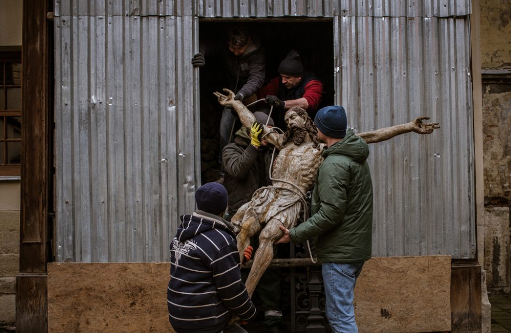 LVIV, UKRAINE, MARCH 4 - Armenian Orthodox Christian Church in Lviv has a 15th-century statue of Christ. The statue, one of the oldest in Ukraine, was removed for storage. Polish technicians who came to help remove it to shelter. The church is from the 17th century.